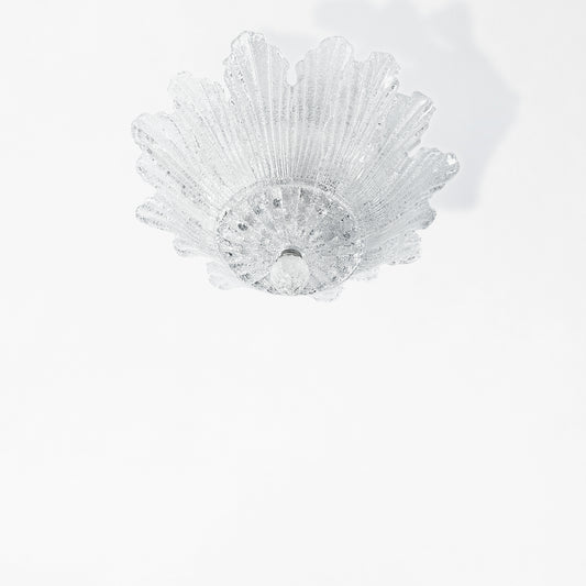 Clear Murano glass flush mount ceiling light.