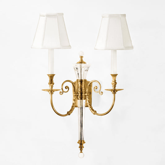 Crystal and antique brass sconce.