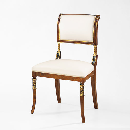 Brown wood chair with gold accents and cream fabric.