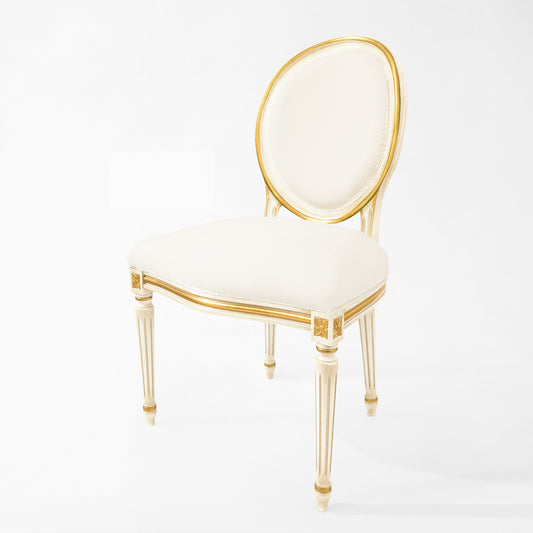 Round white and gold chair with white fabric.