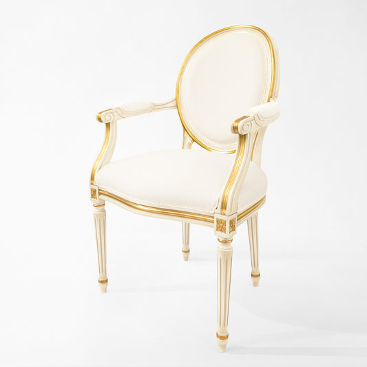 Round white and gold chair with white fabric.