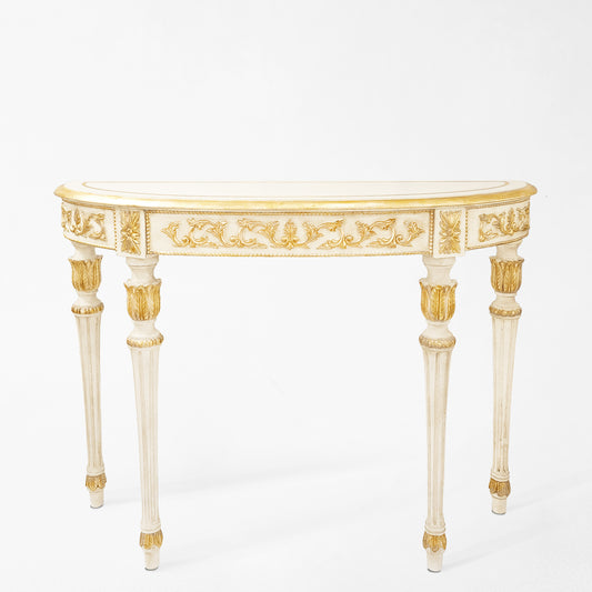 White and gold console table.
