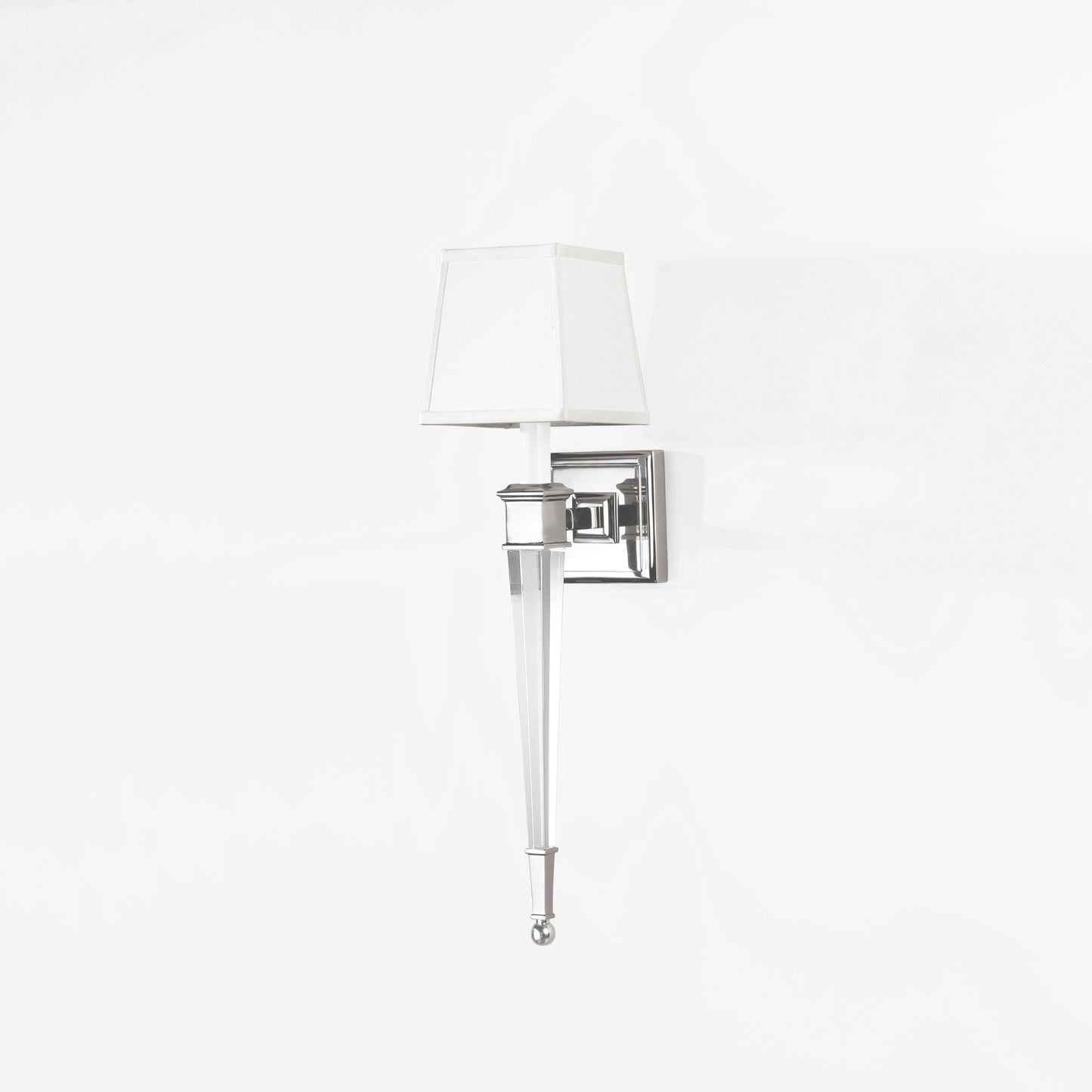 Crystal sconce with polished nickel trim and white shade.