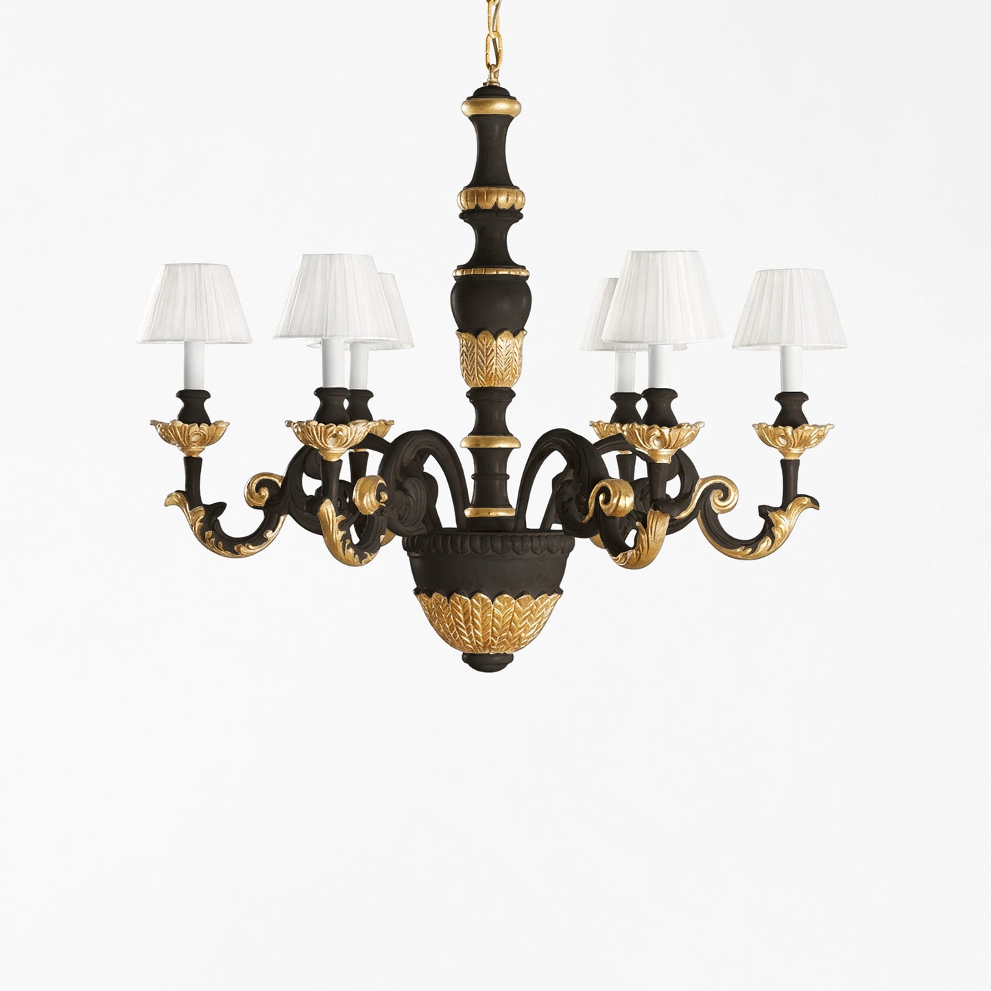 Traditional black and gold Italian chandelier and white pleated shades.