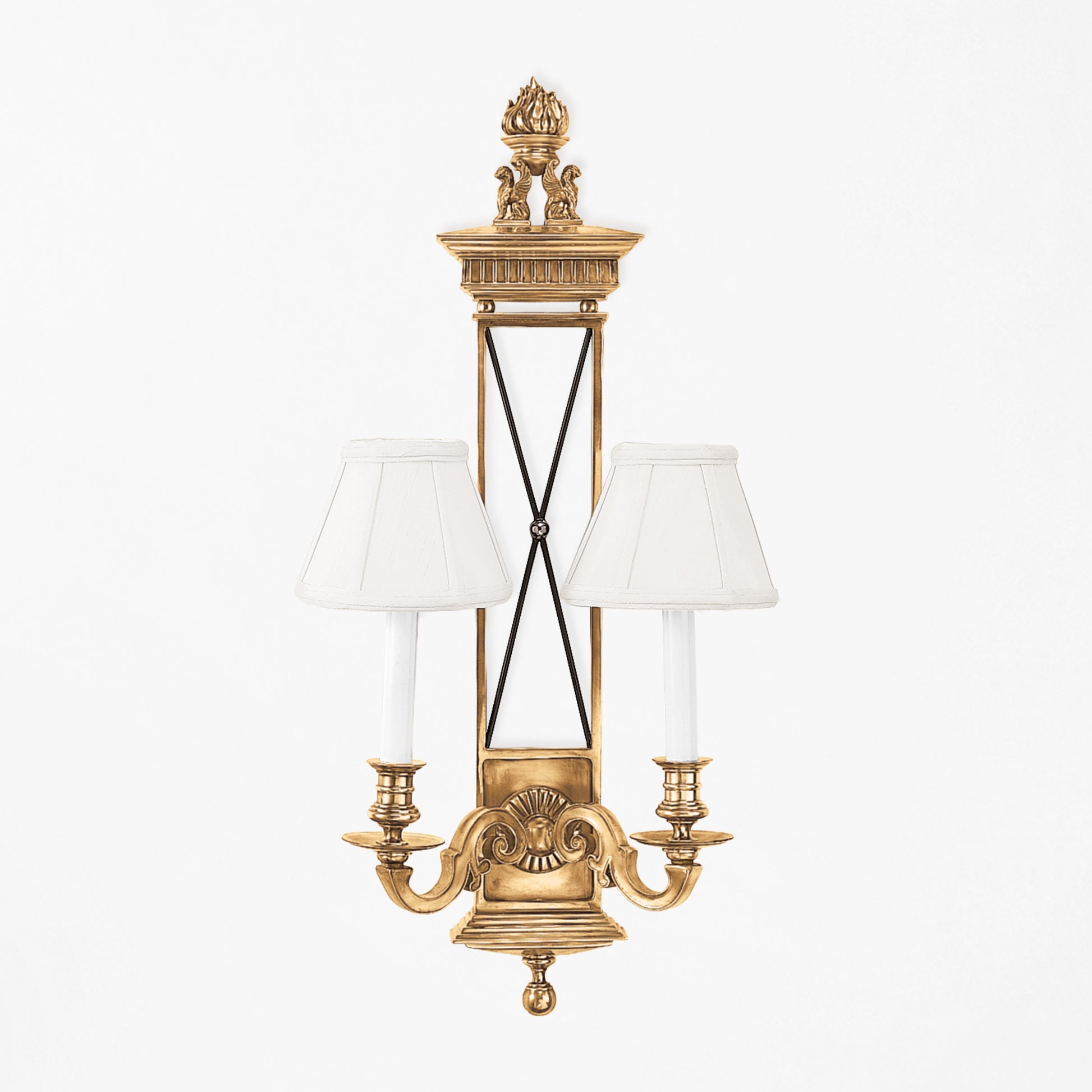 Luxurious brass sconce with white shades.