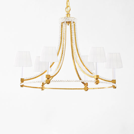 Gold Italian chandelier with crystals and white plated shades.