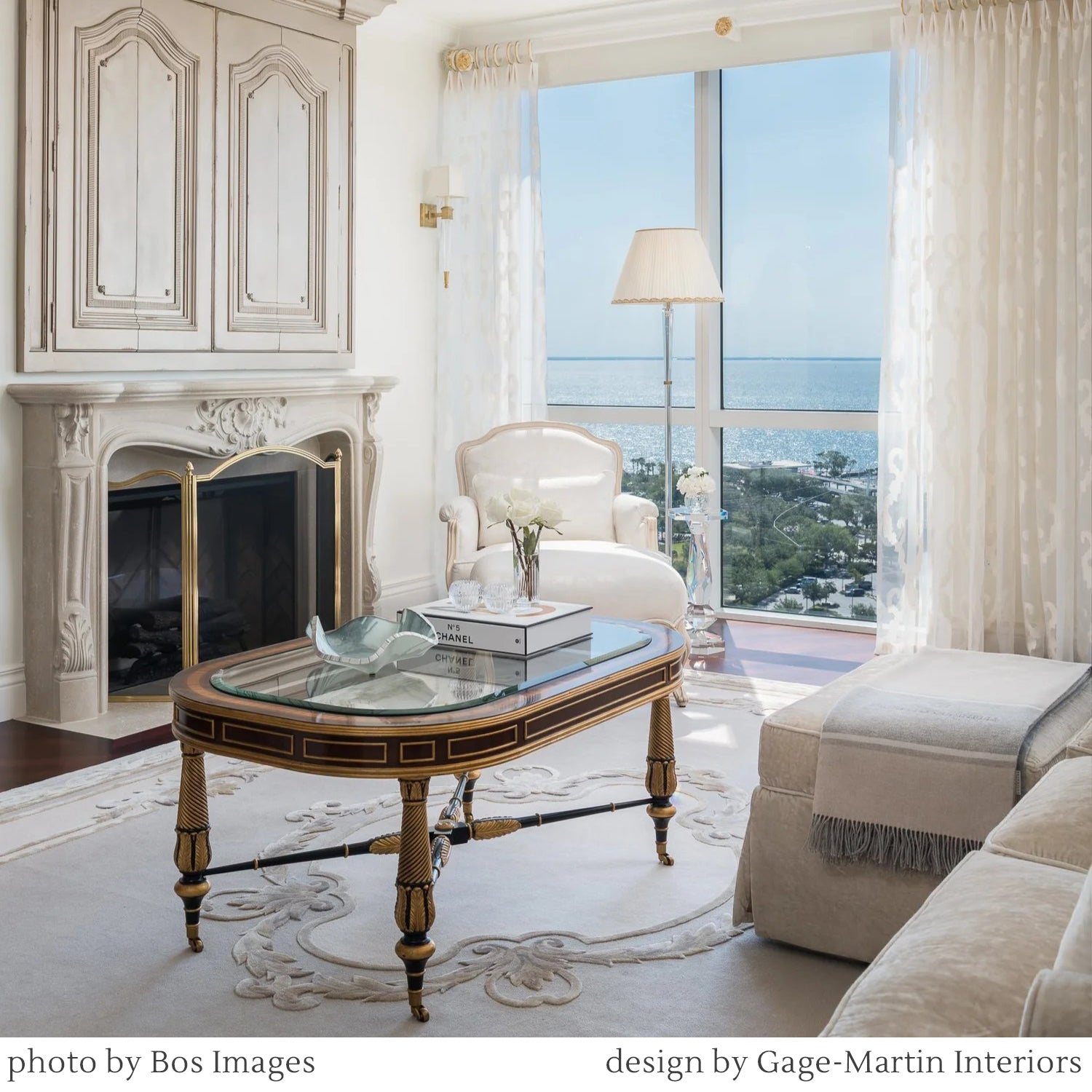 Brass fireplace screen in luxurious living room.