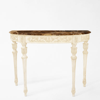A white and brown Italian console table with a marble top.