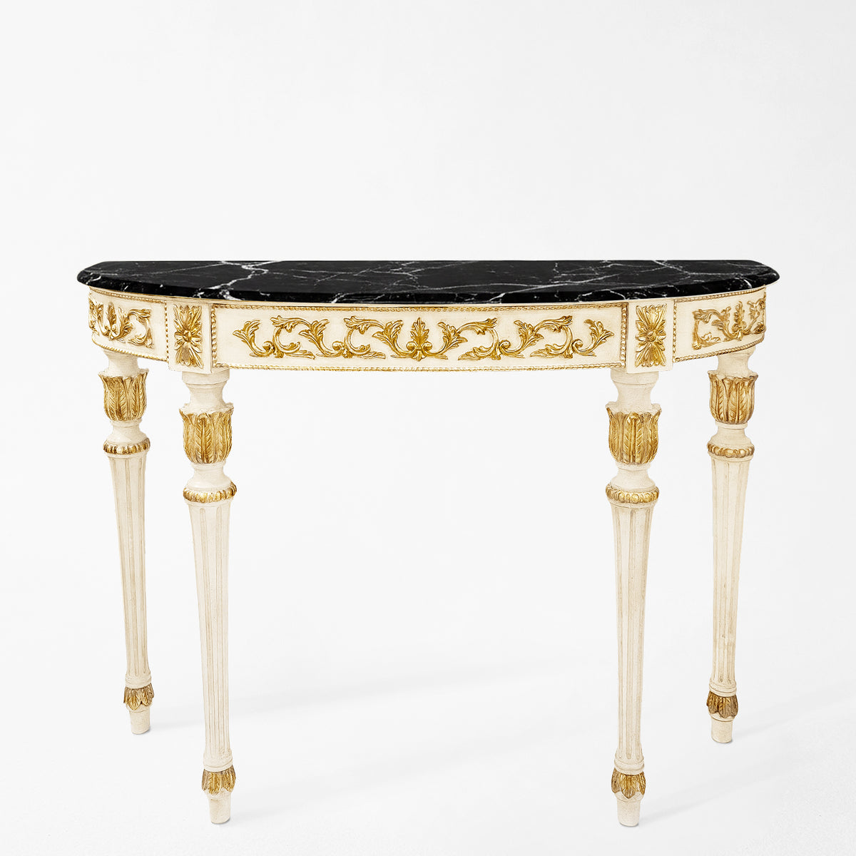 Ornate white and gold Italian console table with black marble top.