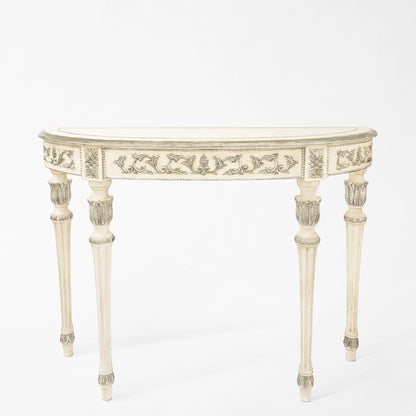 Traditional white Italian console table with carved silver leaf details.
