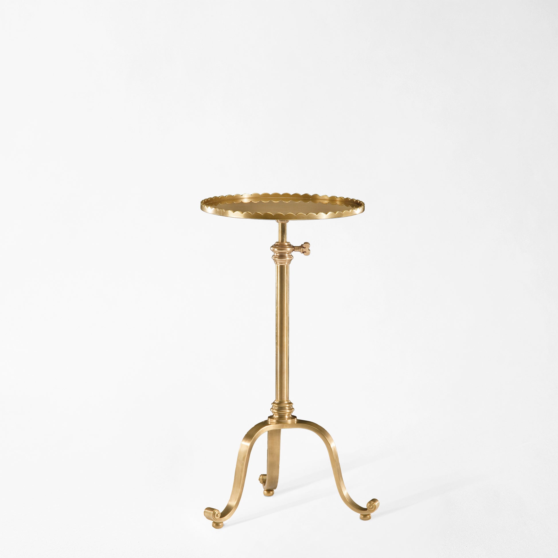 Antique brass accent table.