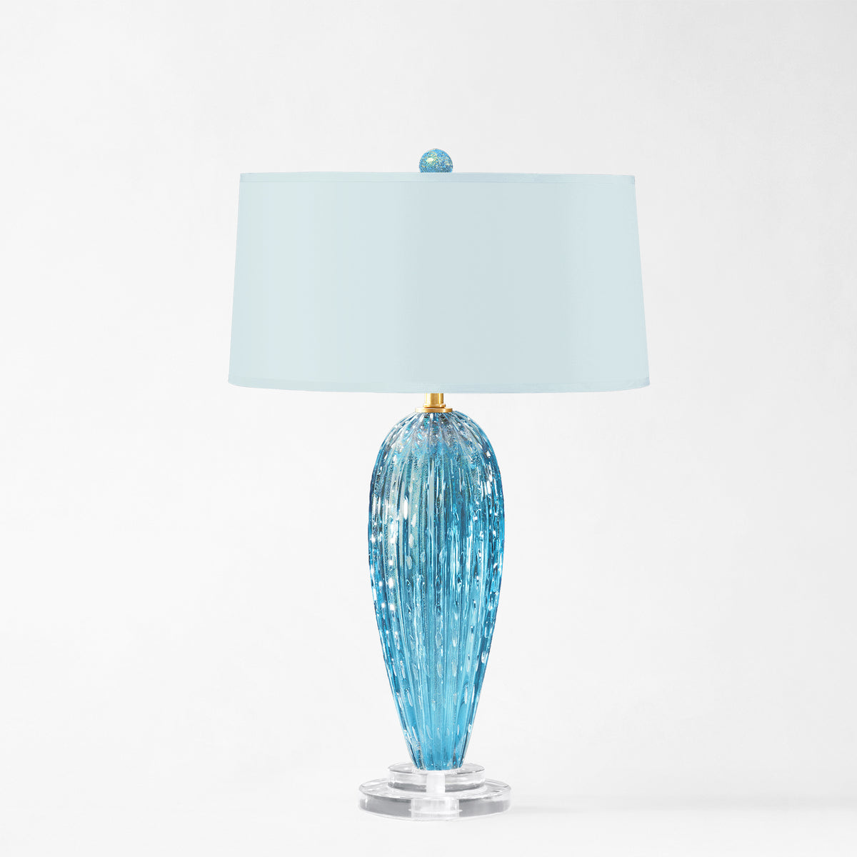 Blue Murano glass lamp with light blue lamp shade.