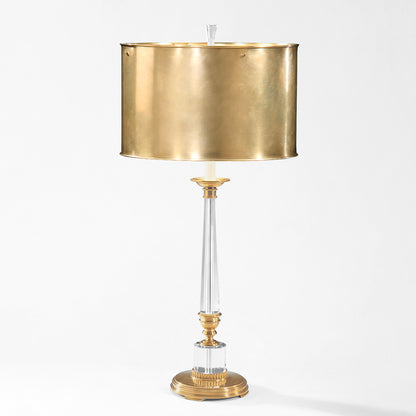 Antique brass and crystal table lamp with brass lamp shade.