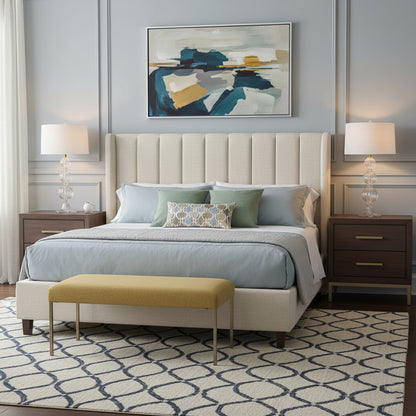 Modern bedroom with a bed, nightstands, and clear Murano glass table lamps.