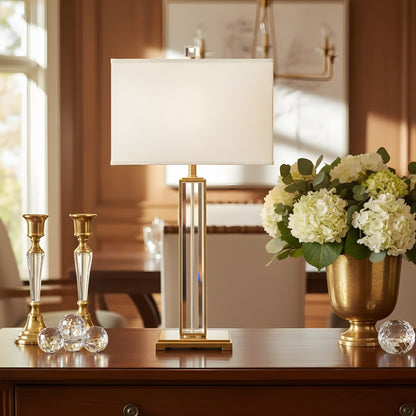 Crystal and antique Brass Table Lamp on a wood dresser.