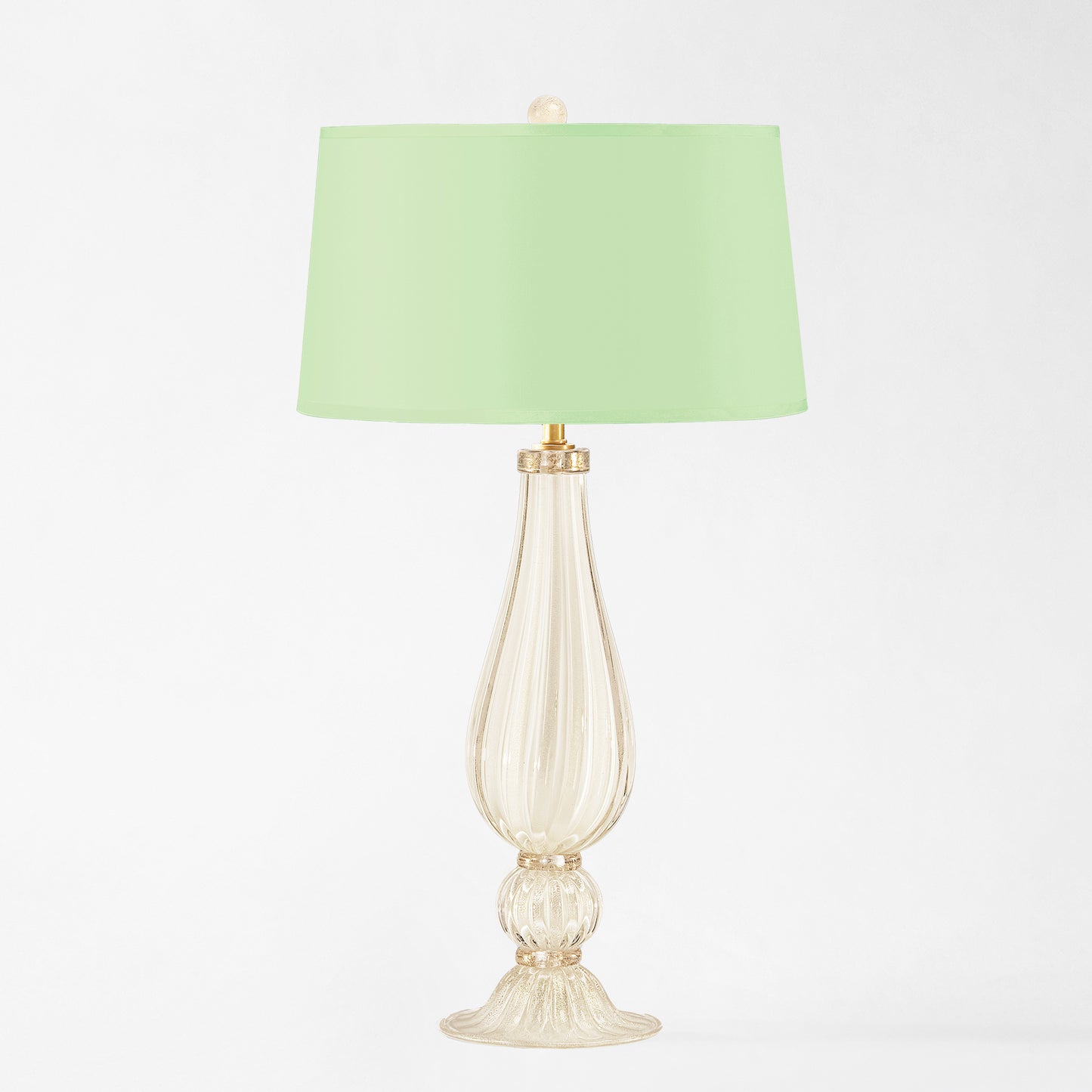 White Murano glass table lamp with light green lamp shade.