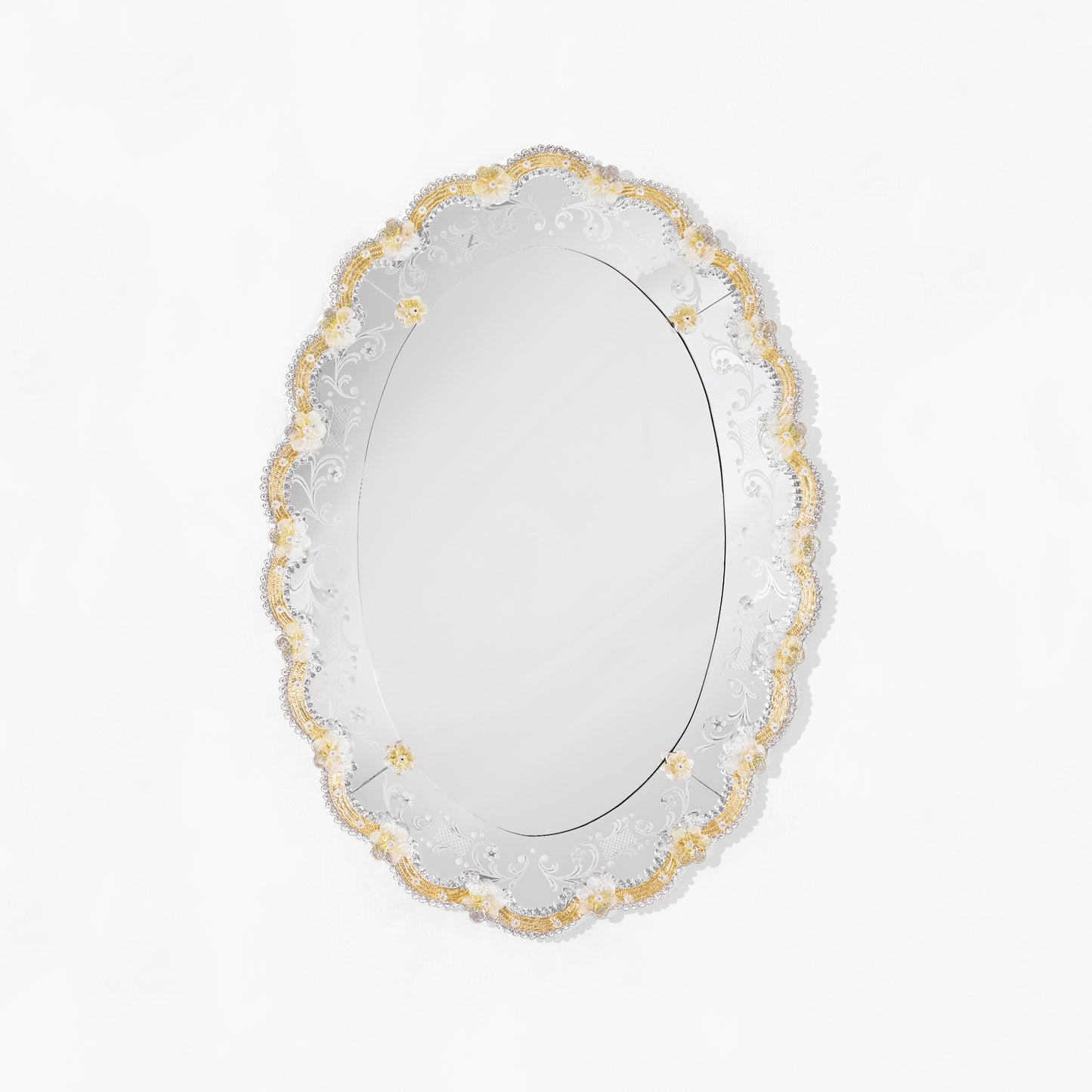 Oval gold Venetian glass mirror.