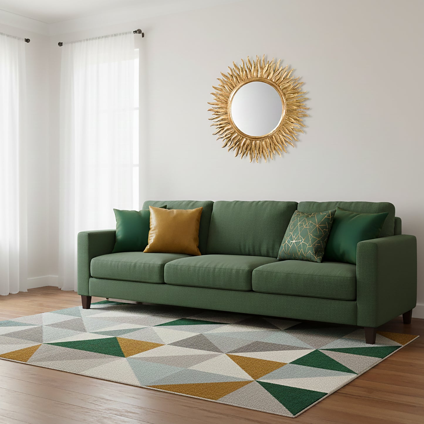 Green sofa with decorative pillows in a room with a hand-carved gold-leaf mirror and geometric rug.