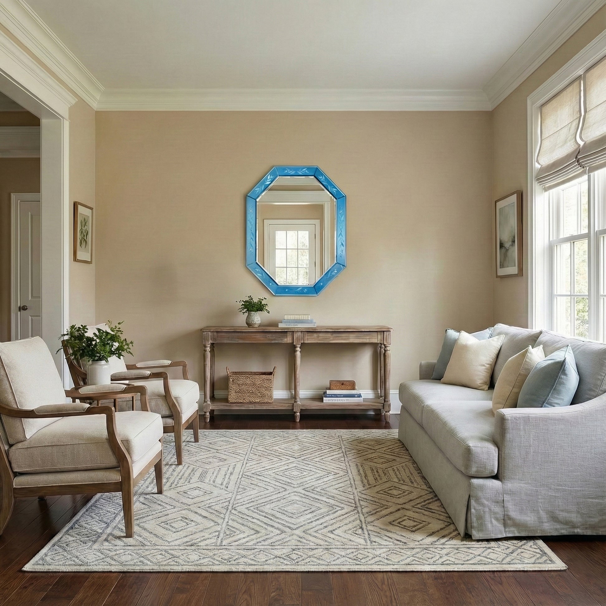 A living room with a blue hand-etched murano glass mirror.