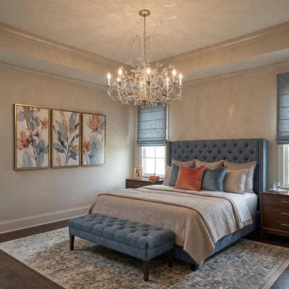 A handmade silver chandelier in a bedroom.