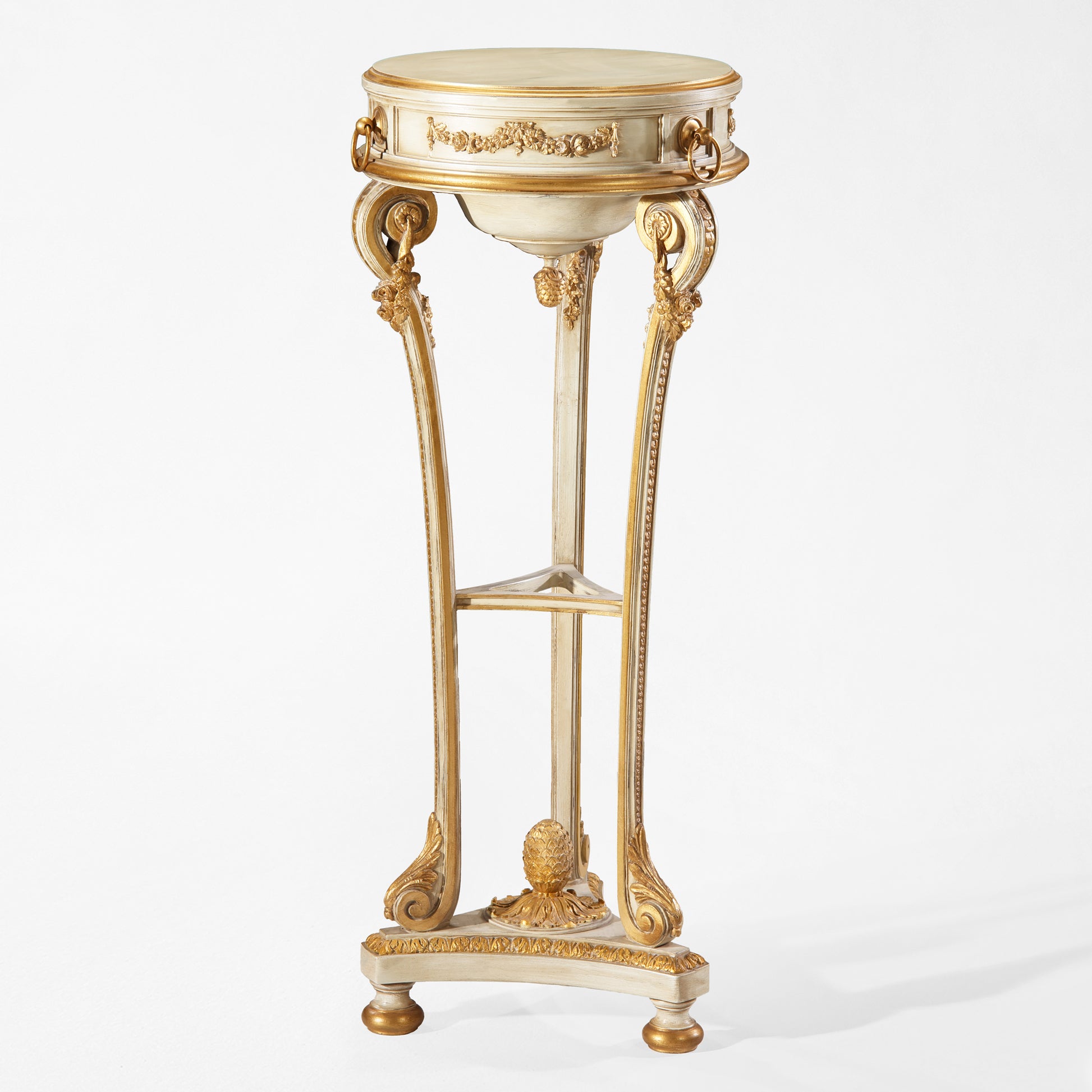 Traditional white and gold wooden pedestal with intricate carved design.