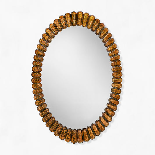 Oval amber Venetian glass mirror.