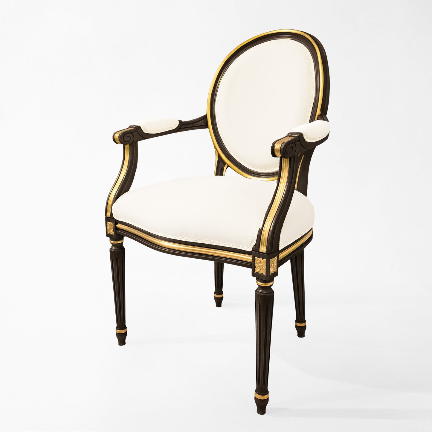 Italian black and gold armchair with cream fabric.