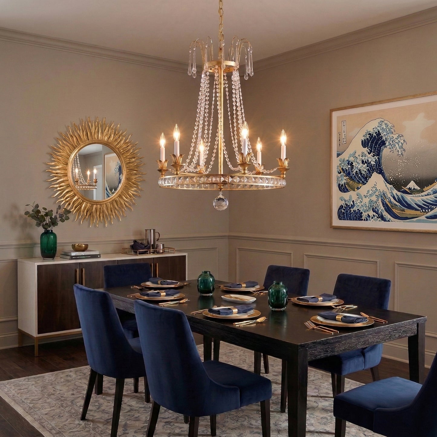 Gold Italian chandelier and gold Italian mirror in luxurious dining room.