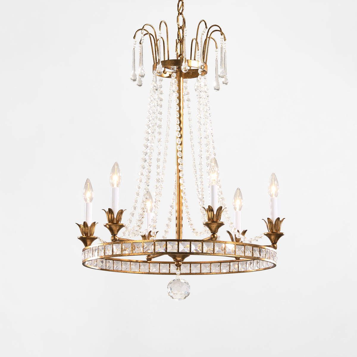 Antique gold Italian chandelier with crystals.
