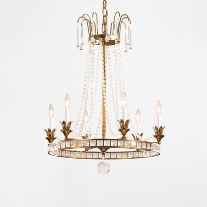 Antique gold Italian chandelier with crystals.