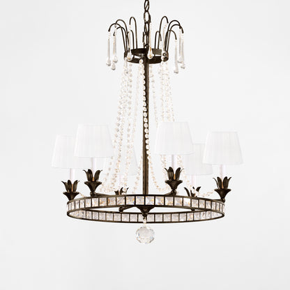 Brown Italian chandelier with antique iron trim.