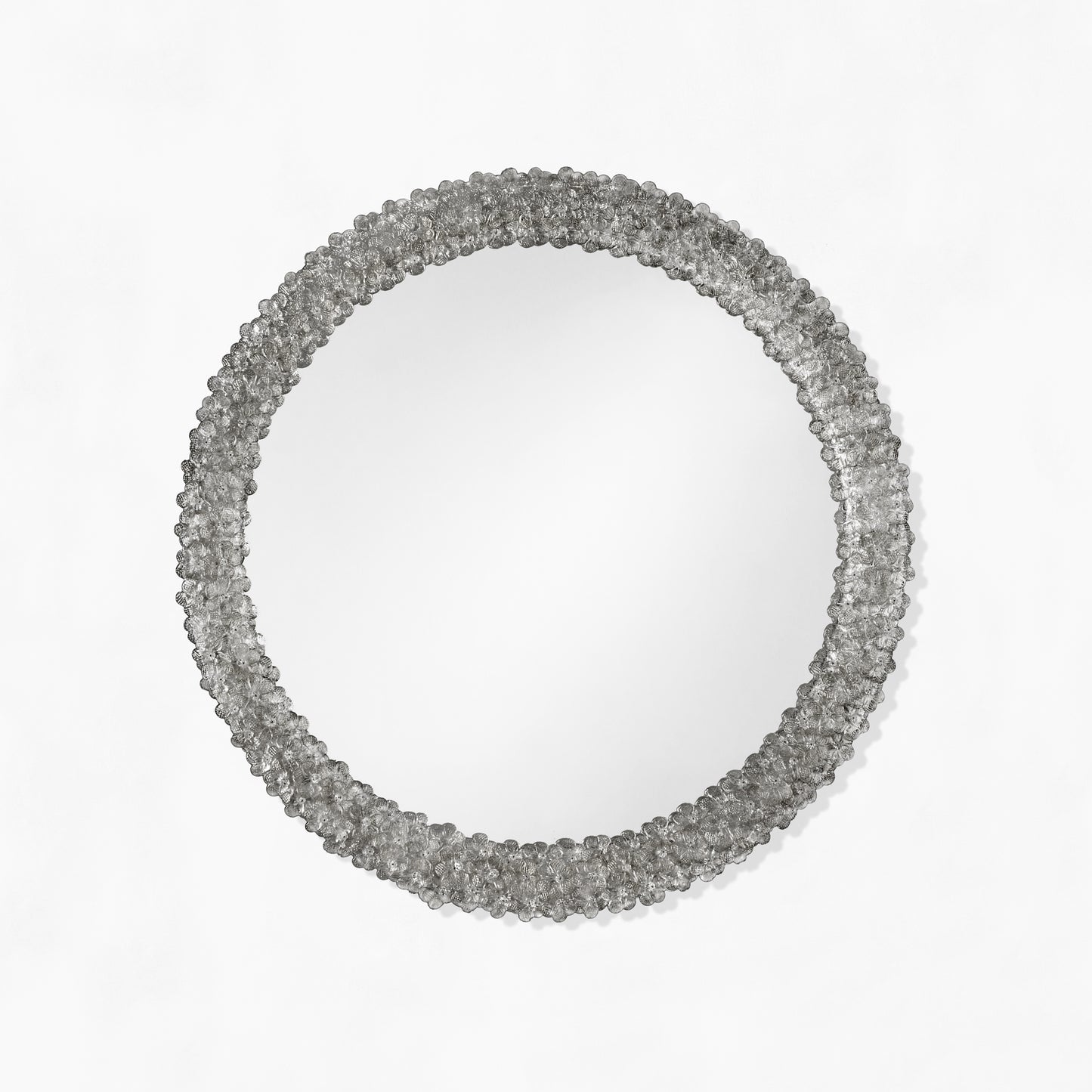 Round black Venetian glass mirror.