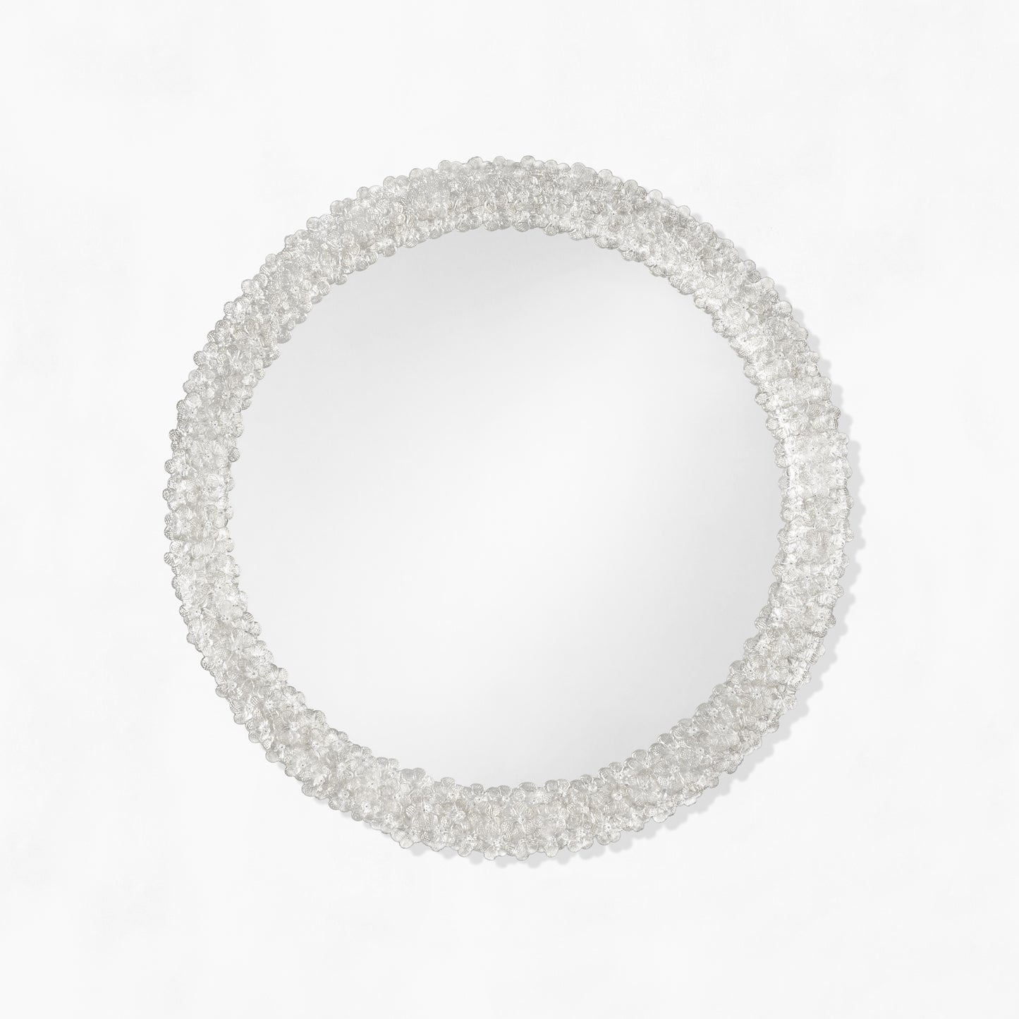 Round clear Venetian glass mirror.