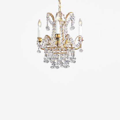 Gold Italian chandelier with crystals.