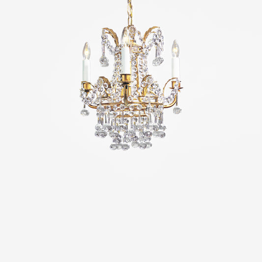 Gold Italian chandelier with crystals.