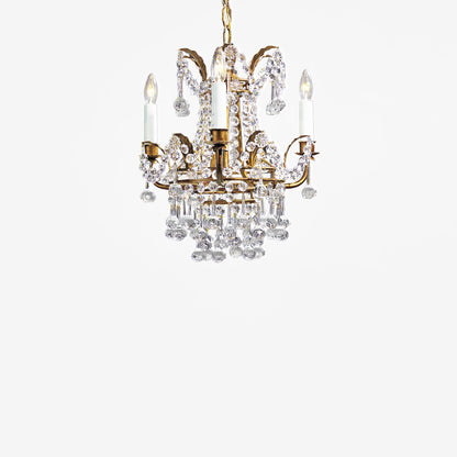Antique gold Italian chandelier with crystals.