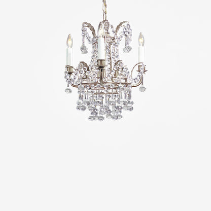 Silver Italian chandelier with crystals.