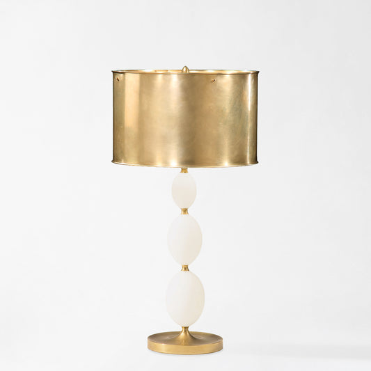 Alabaster table lamp with brass accents and brass lamp shade.