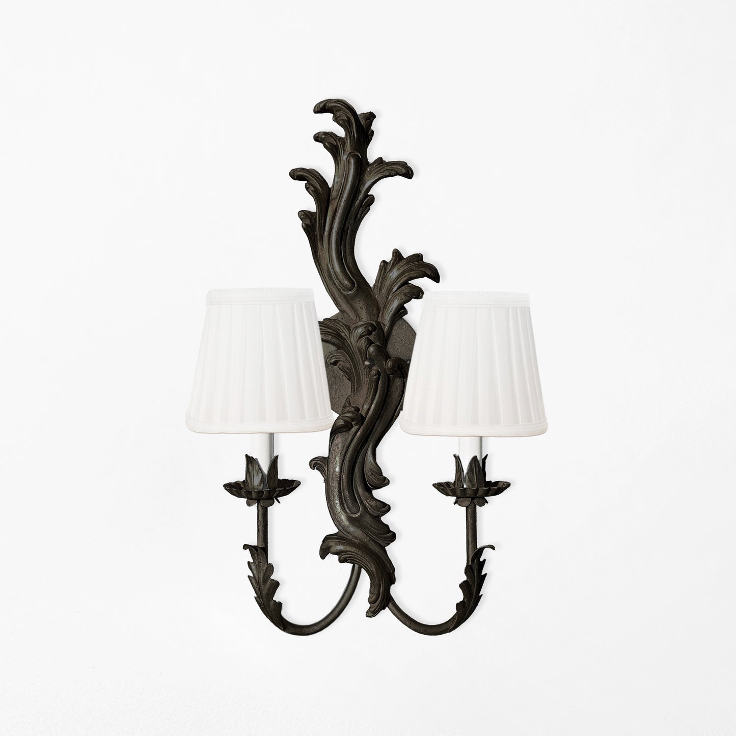 Traditional black wood sconce with white pleated shades.