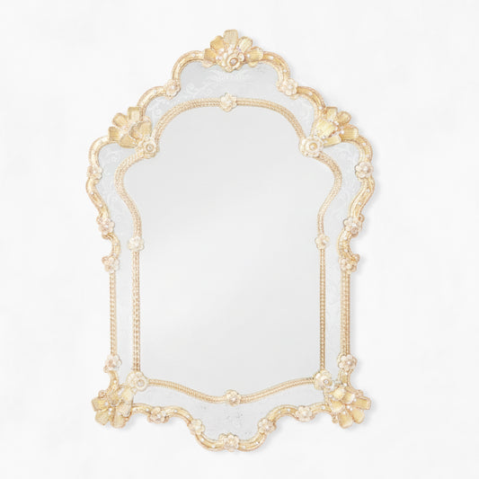 Ornate gold Venetian glass mirror.