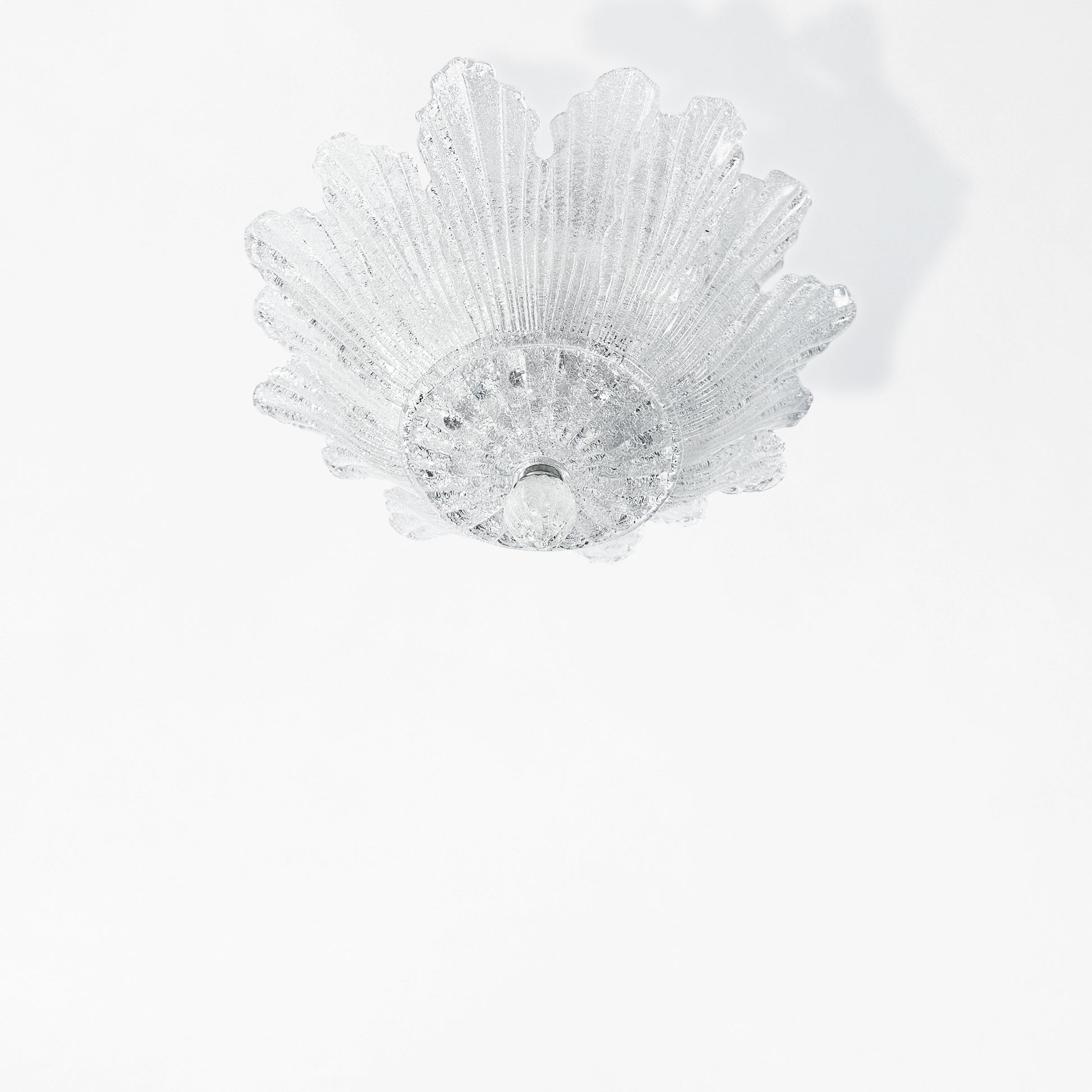Clear Murano glass flush mount ceiling light.