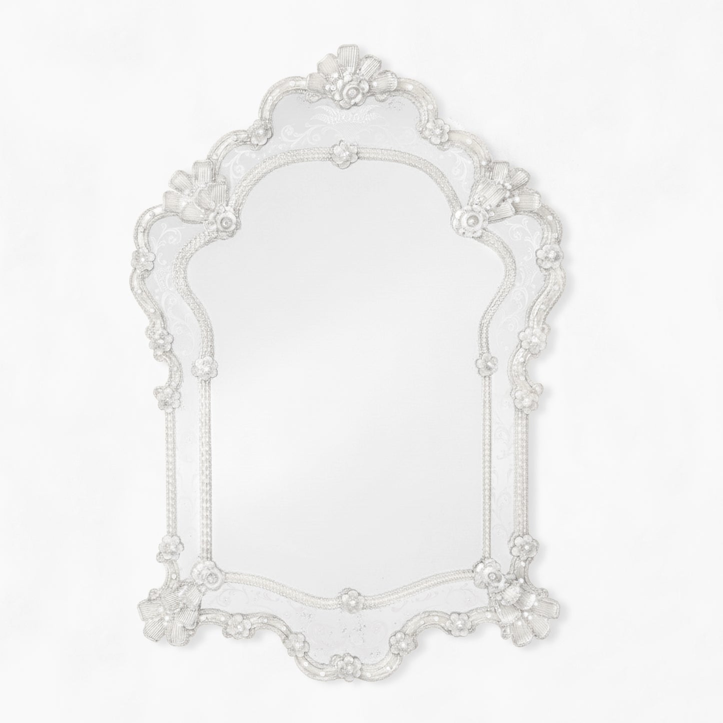 Ornate clear Murano glass mirror.