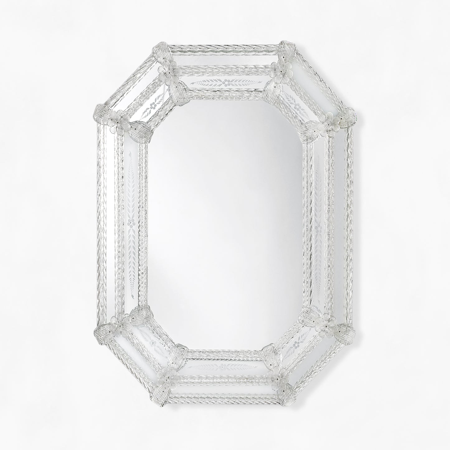 Clear octagonal Murano glass mirror with etched design.