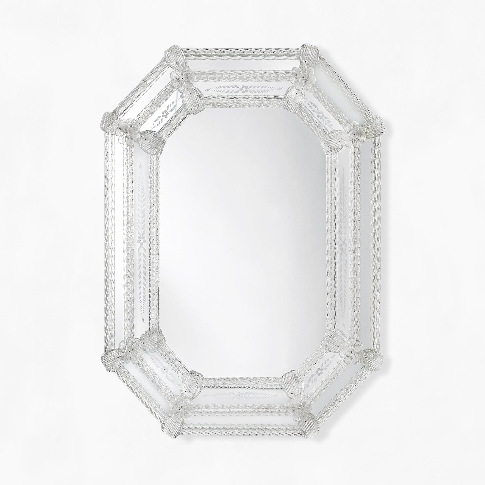 Clear octagonal Murano glass mirror with etched design.
