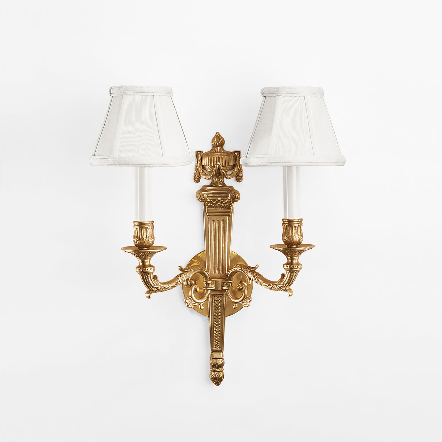 An antique brass sconce.
