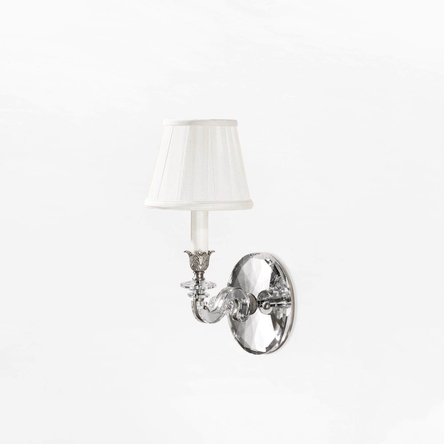 Luxurious crystal sconce with polished nickel details and white pleated shade.