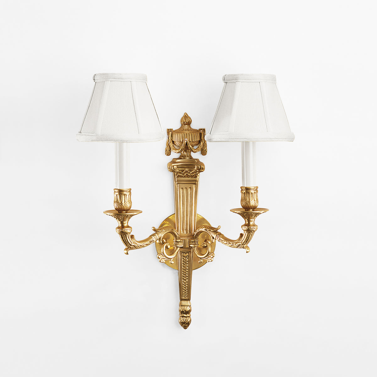 An antique brass sconce
