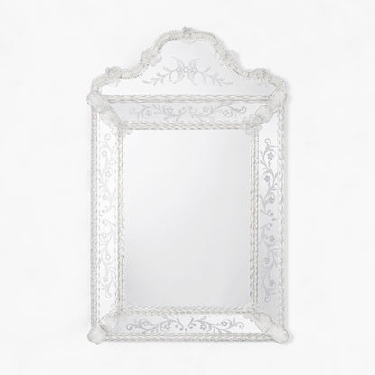 Ornate Venetian glass mirror.
