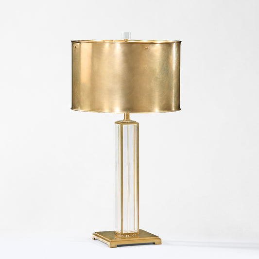 Antique brass and crystal table lamp with brass shade.