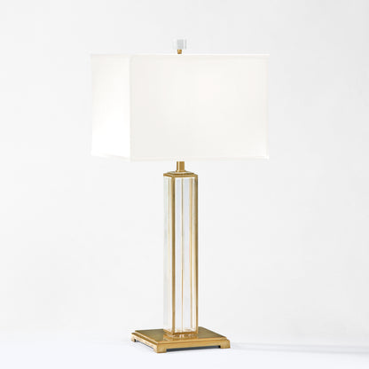 Antique brass and crystal table lamp.